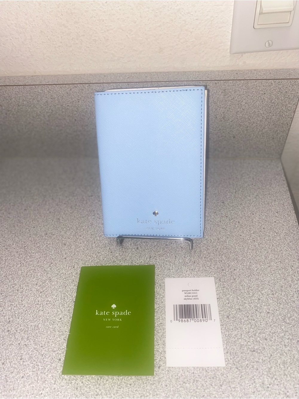 Kate Spade Mikas Pond Sky Blue Leather Passport Holder WLRU1811 NWT
